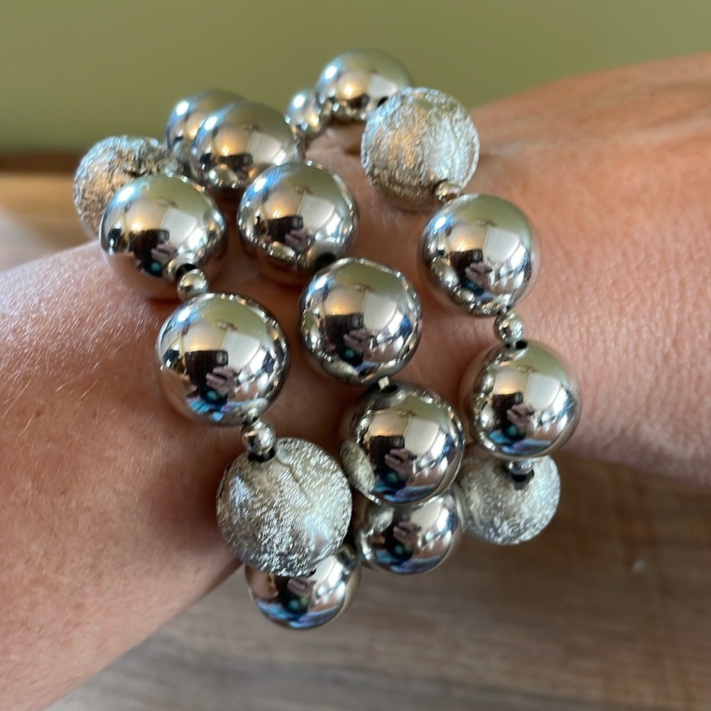 Silver ball bracelet stack.